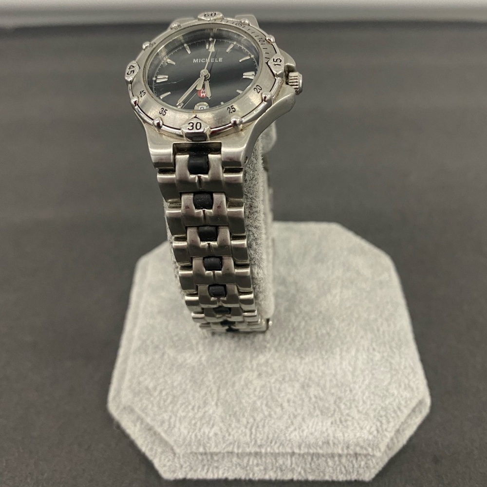 Michele Stainless Steel With Black Face Women’s Watch.  This is a small face